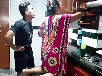 Diana Prince attempts to sate her sonny with her cooch in the kitchen