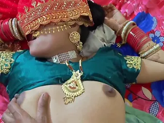 Beautiful Indian couple engaged in passionate bedroom bill of fare